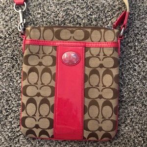 Coach Crossbody purse with hot pink accents